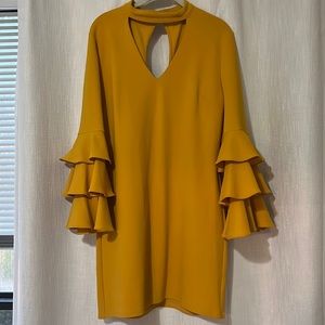 Mustard yellow cocktail dress with bell sleeves